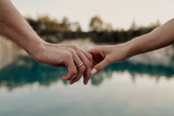 Love couple. Holding hands